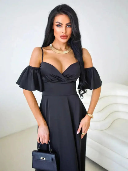Black maxi dress with off-shoulder flutter sleeves and a V-neckline, showcasing a chic and elegant style.