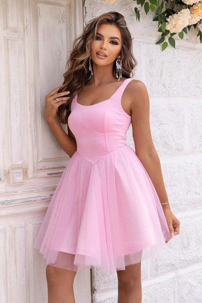 Blair Mini Dress in soft pink, featuring a tailored silhouette and tulle skirt, perfect for summer, weddings, and parties.