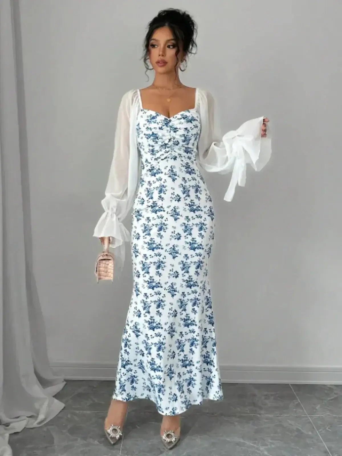 Bluebelle Maxi Dress featuring vintage floral print and sheer puff sleeves, perfect for elegant occasions.