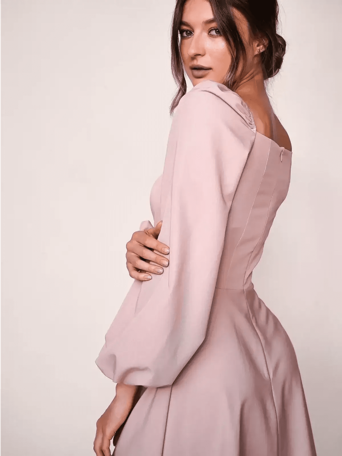 Pink Blush Aura mini dress featuring puff sleeves and a fitted bodice, perfect for wedding guests or formal occasions.