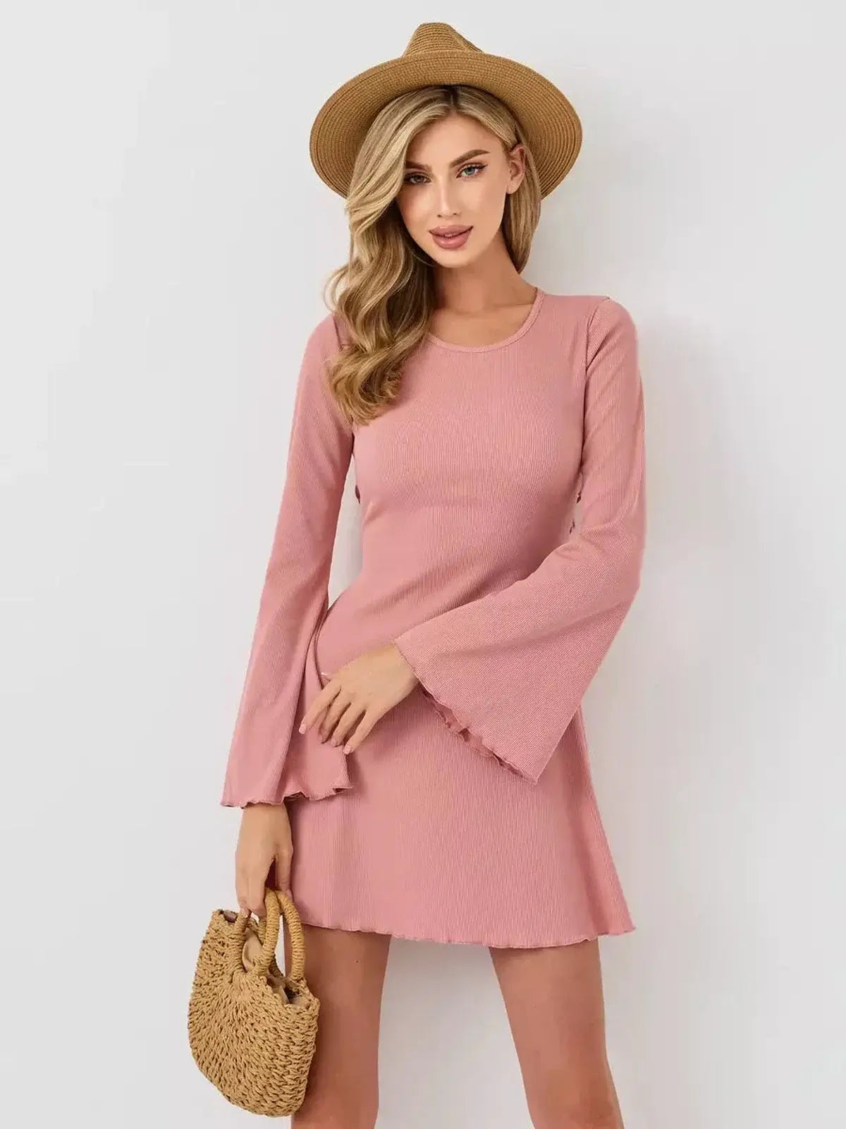 Blush Aura mini dress by Lauven, featuring a pink A-line silhouette with flared sleeves and a U-neckline.