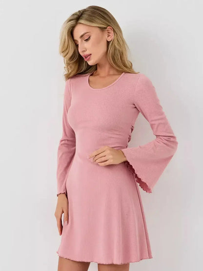 Lauven Blush Flare dress in soft pink with flared sleeves and scoop neckline, embodying elegance and sculpted style.
