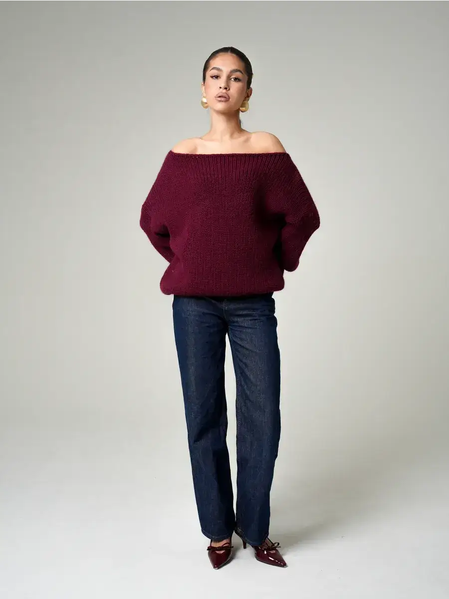 Bordeaux Sweater by Lauven featuring an oversized off-shoulder knit in deep wine, styled for modern luxury.