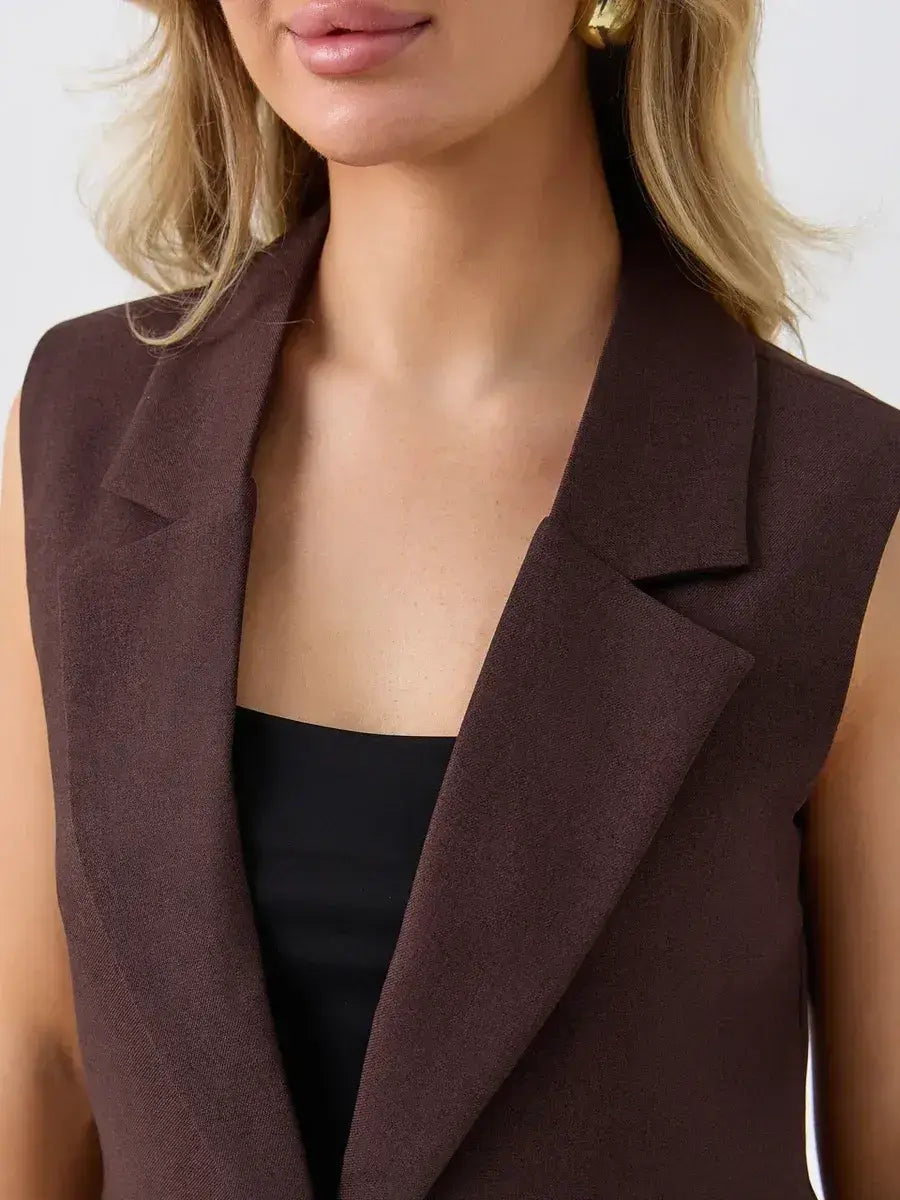 Cacao Suit Set by Lauven featuring a sleeveless chocolate vest showcasing tailored details and modern elegance.