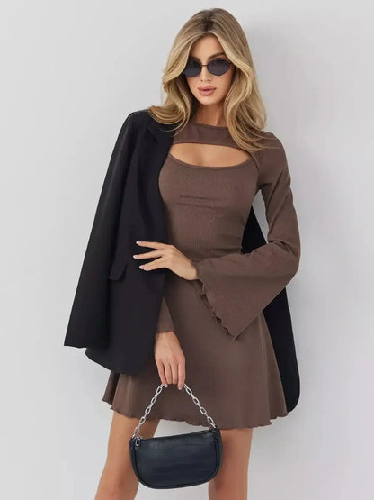 Café Flare mini dress by Lauven featuring long sleeves, chest cut-out, A-line silhouette, and flared cuffs.