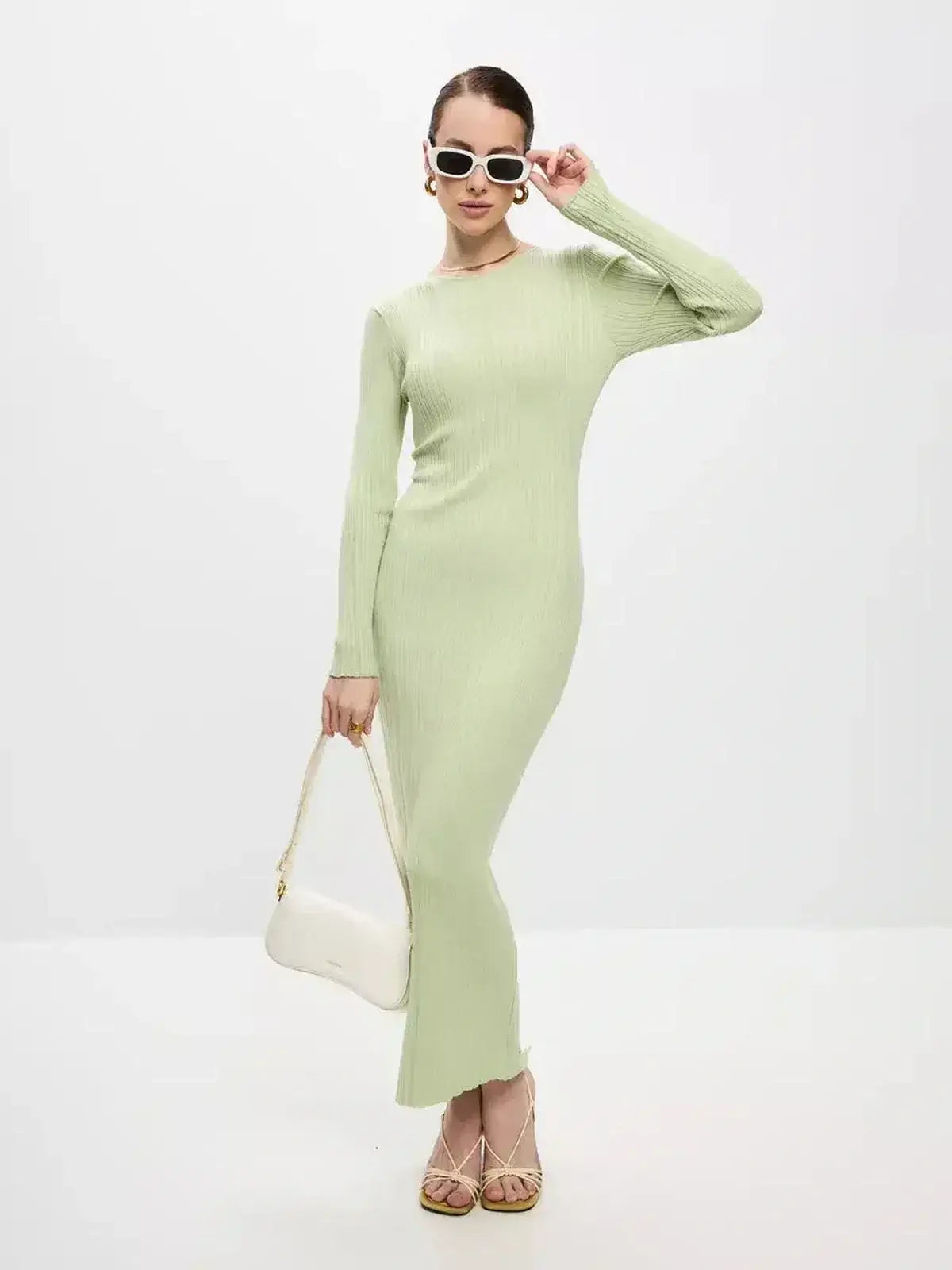 Celery Luxe Maxi Dress by Lauven, showcasing a light green ribbed-knit design and elegant silhouette.