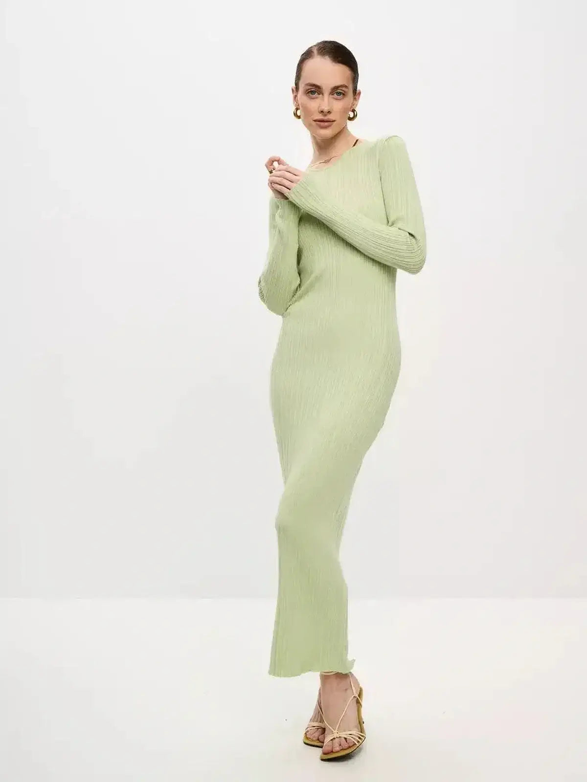 Celery Luxe Maxi Dress by Lauven, a light green ribbed-knit gown with long sleeves and seamless elegance.
