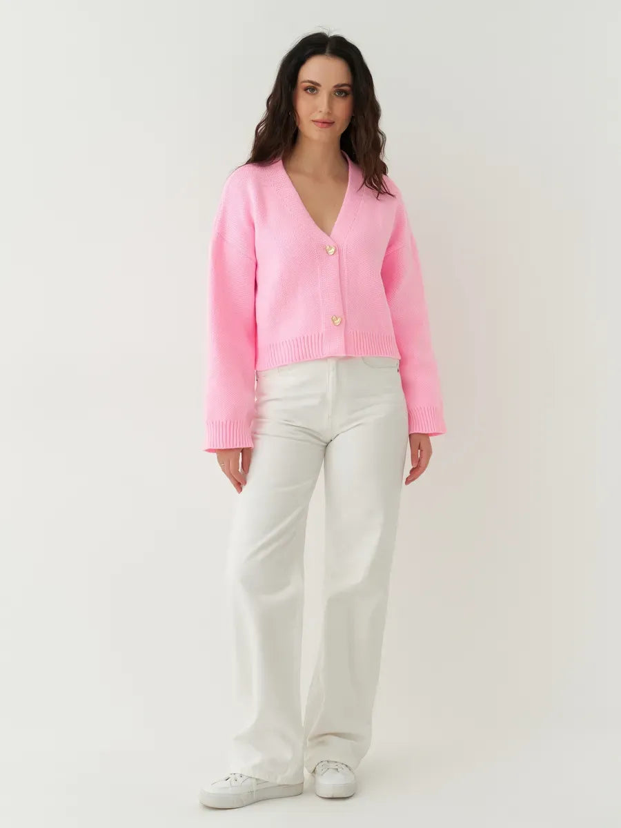 Celeste Cardigan by Lauven, cropped pink knit with heart buttons, perfect for casual or polished looks.