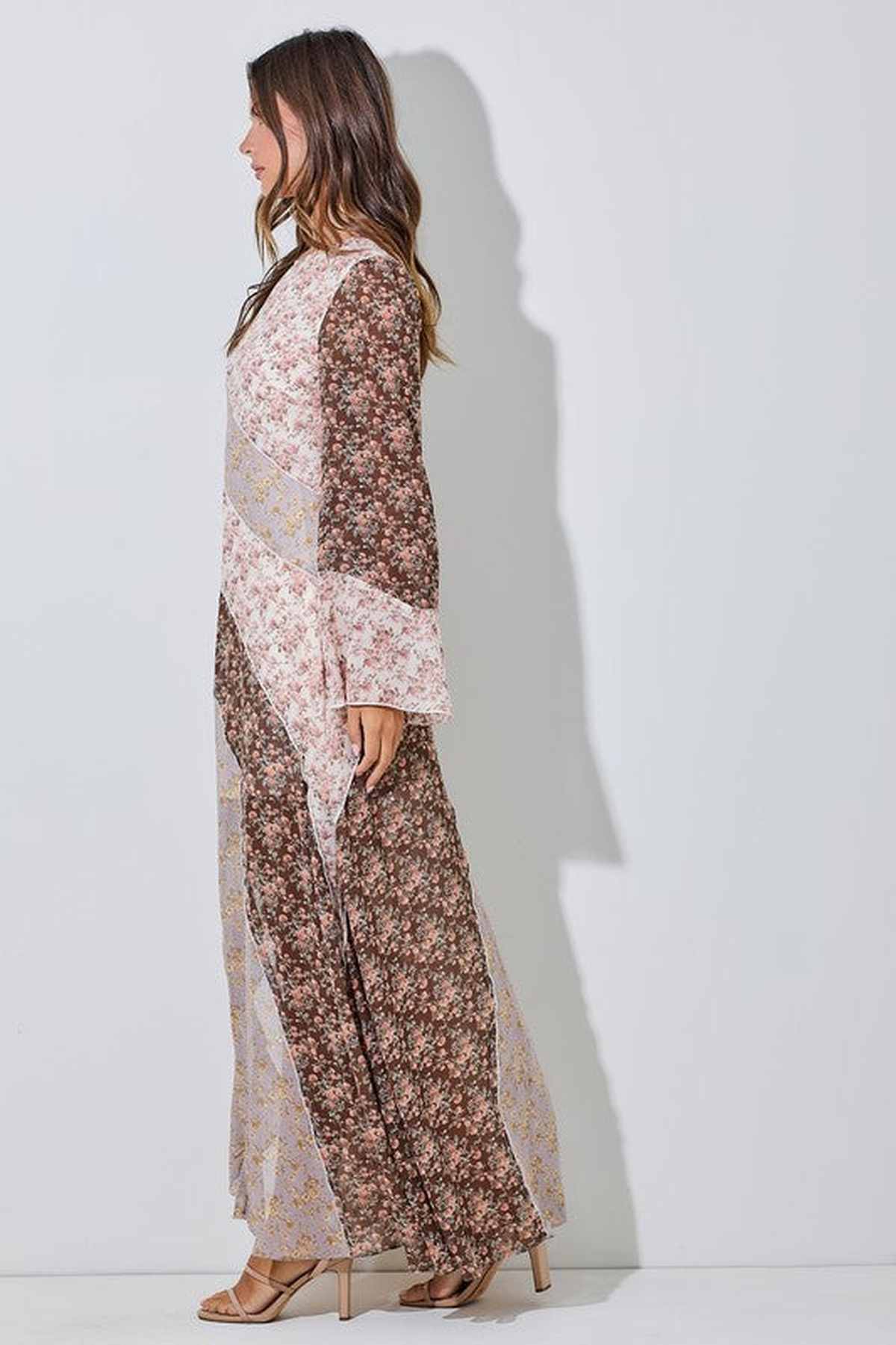 Celeste Maxi Dress in floral patchwork design, featuring a flowing silhouette and flared sleeves, perfect for summer weddings and events.