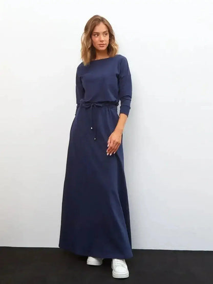 Celeste Maxi Dress in navy with long sleeves and a relaxed fit, perfect for weddings and summer events.