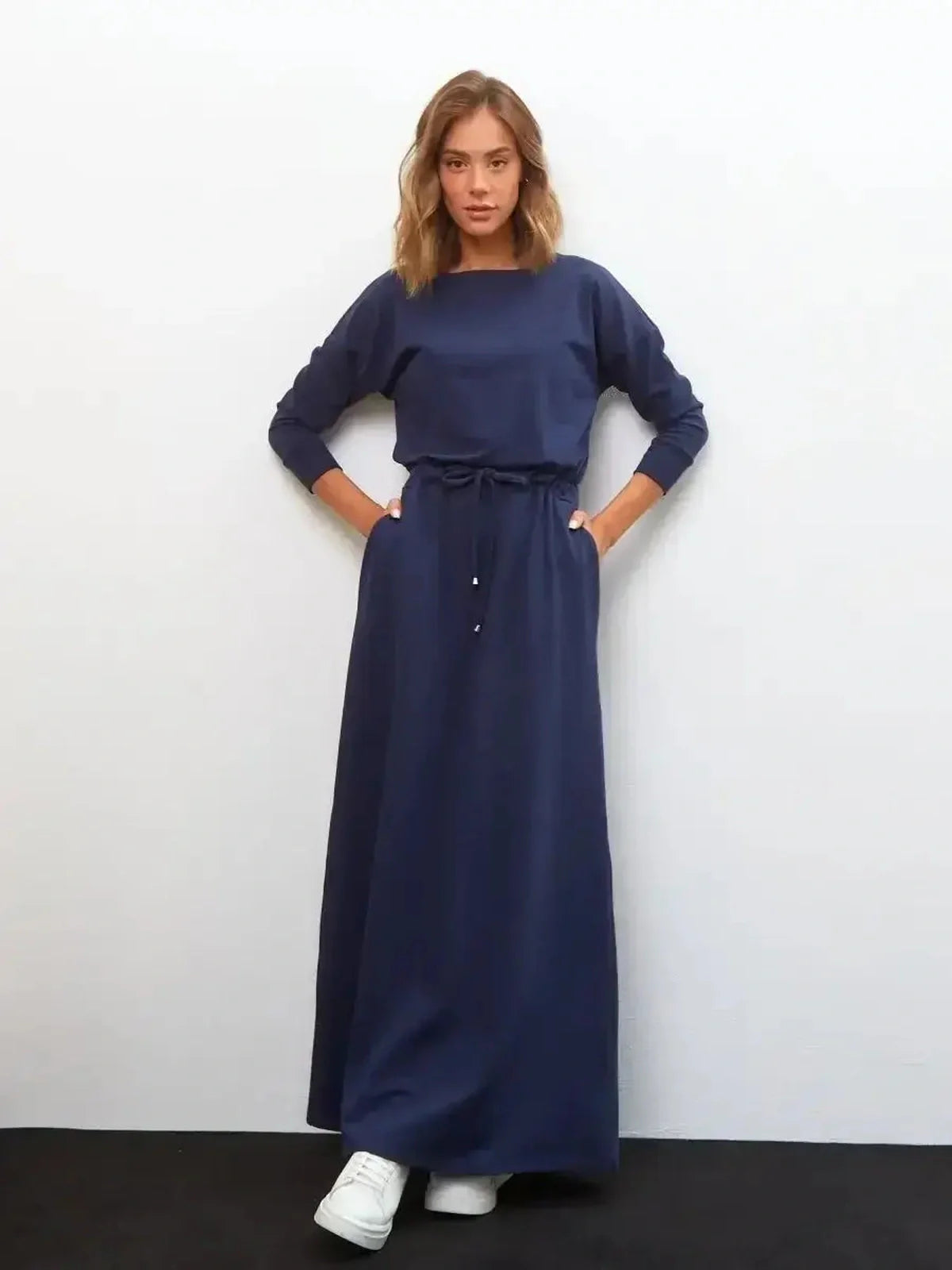 Celeste Maxi Dress in navy, featuring long sleeves and relaxed fit, perfect for weddings or summer events.