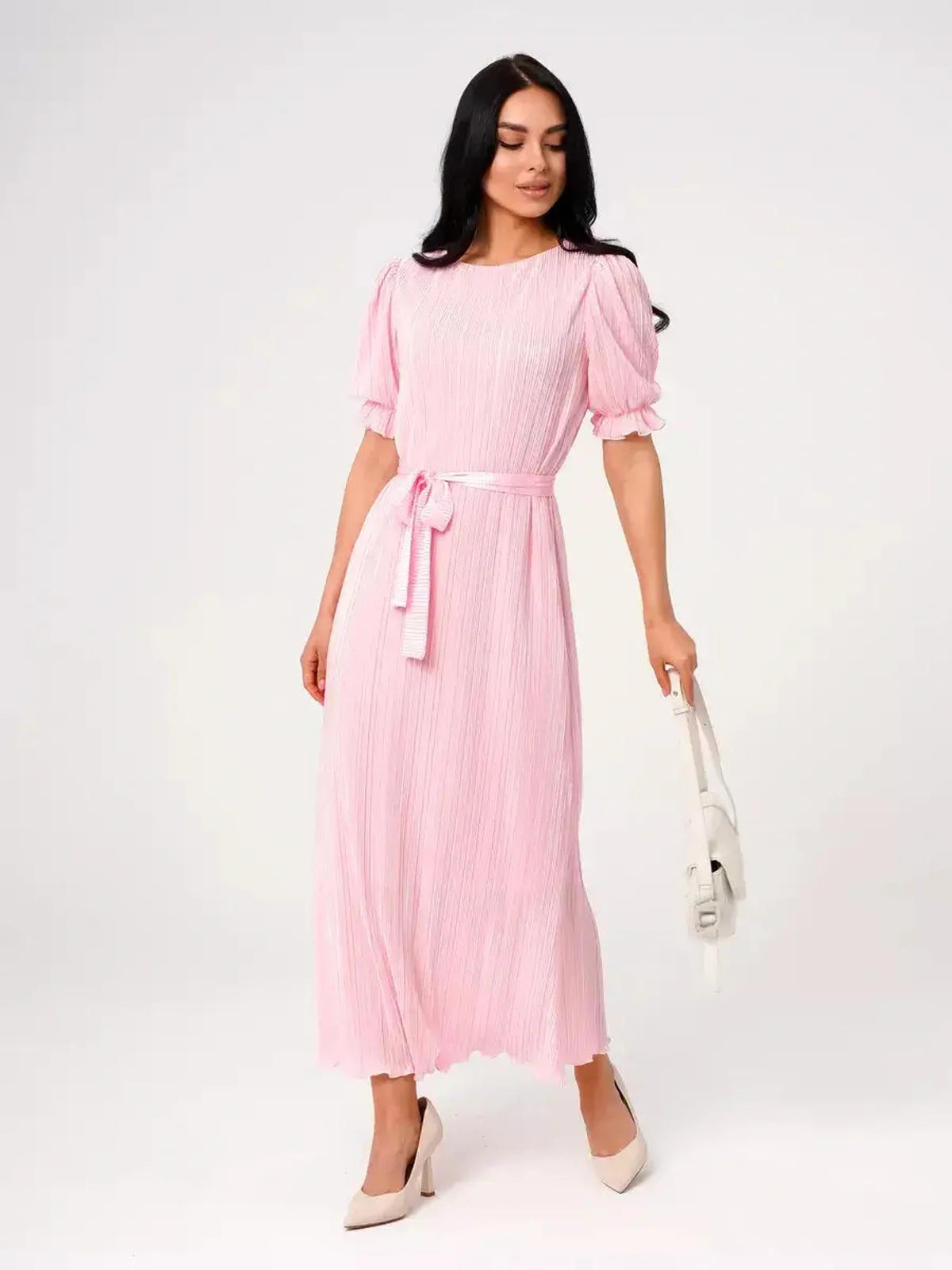 Celeste Maxi Dress in pink, featuring puff sleeves and a tie waist, perfect for summer weddings and formal occasions.
