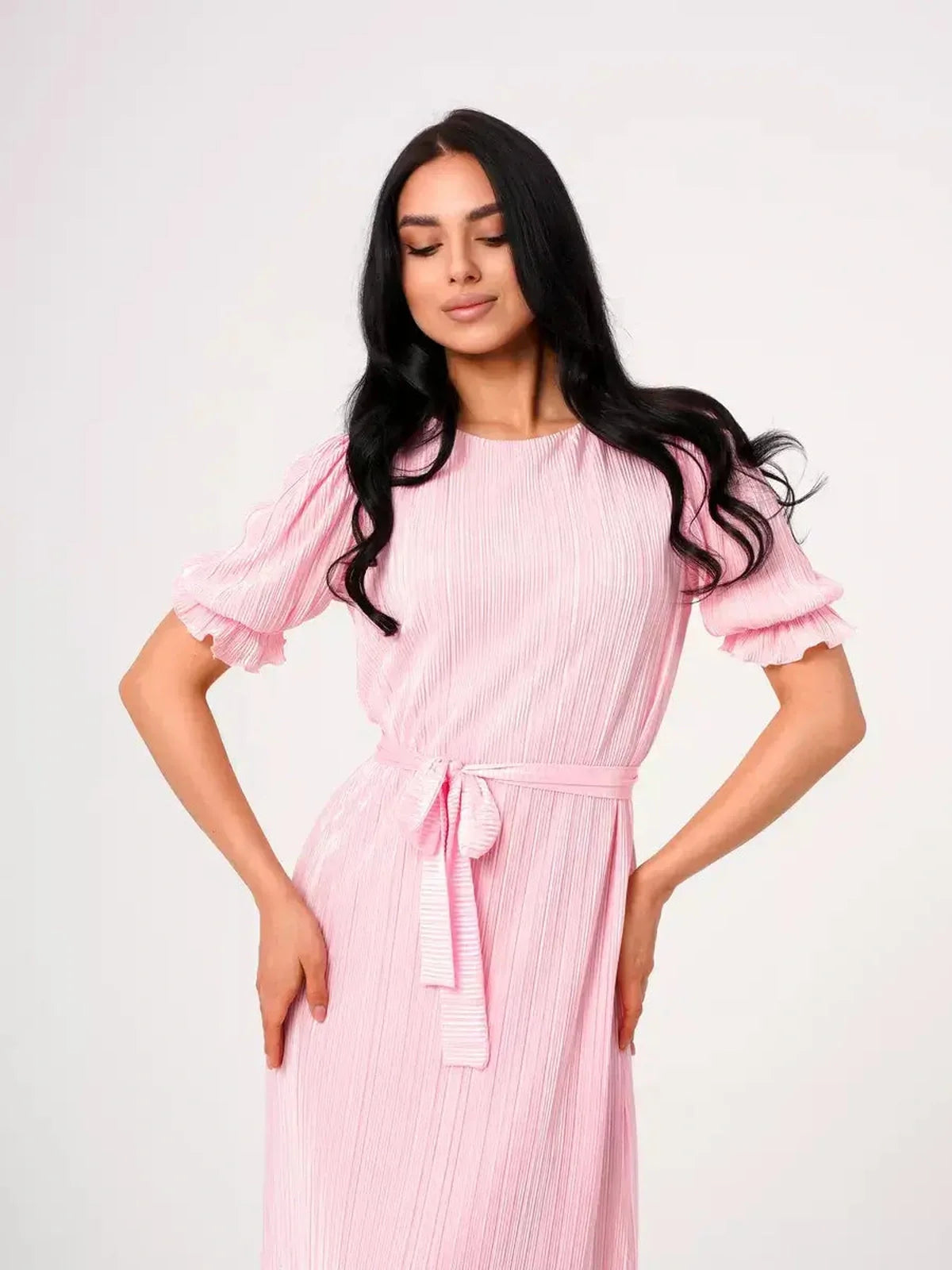 Celeste Maxi Dress in pink, featuring pleated fabric, puff sleeves, and a tie waist, perfect for summer and wedding guests.