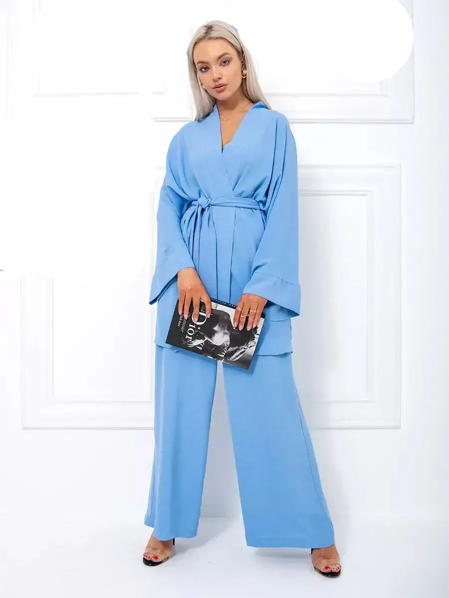 Celeste Suit Set by Lauven, elegant oversized two-piece set in soft blue with kimono-style robe and wide-leg pants.