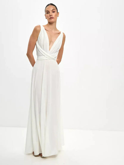 Celeste Wrap Maxi Dress in white featuring a draped V-neckline and convertible tie detail for elegant styling.