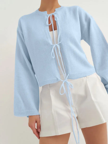 Celina Cardigan by Lauven in soft sky blue, a lightweight summer knitwear essential for women's effortless style.