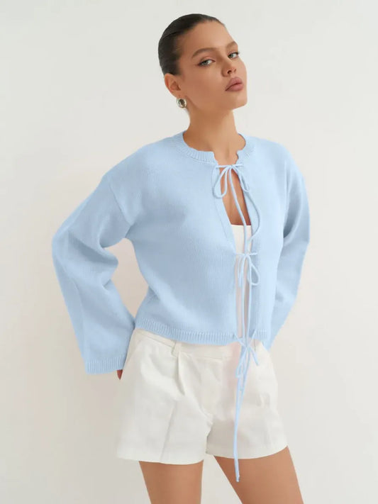 Celina Cardigan by Lauven in soft sky blue, lightweight summer knitwear for women, featuring a cropped silhouette.