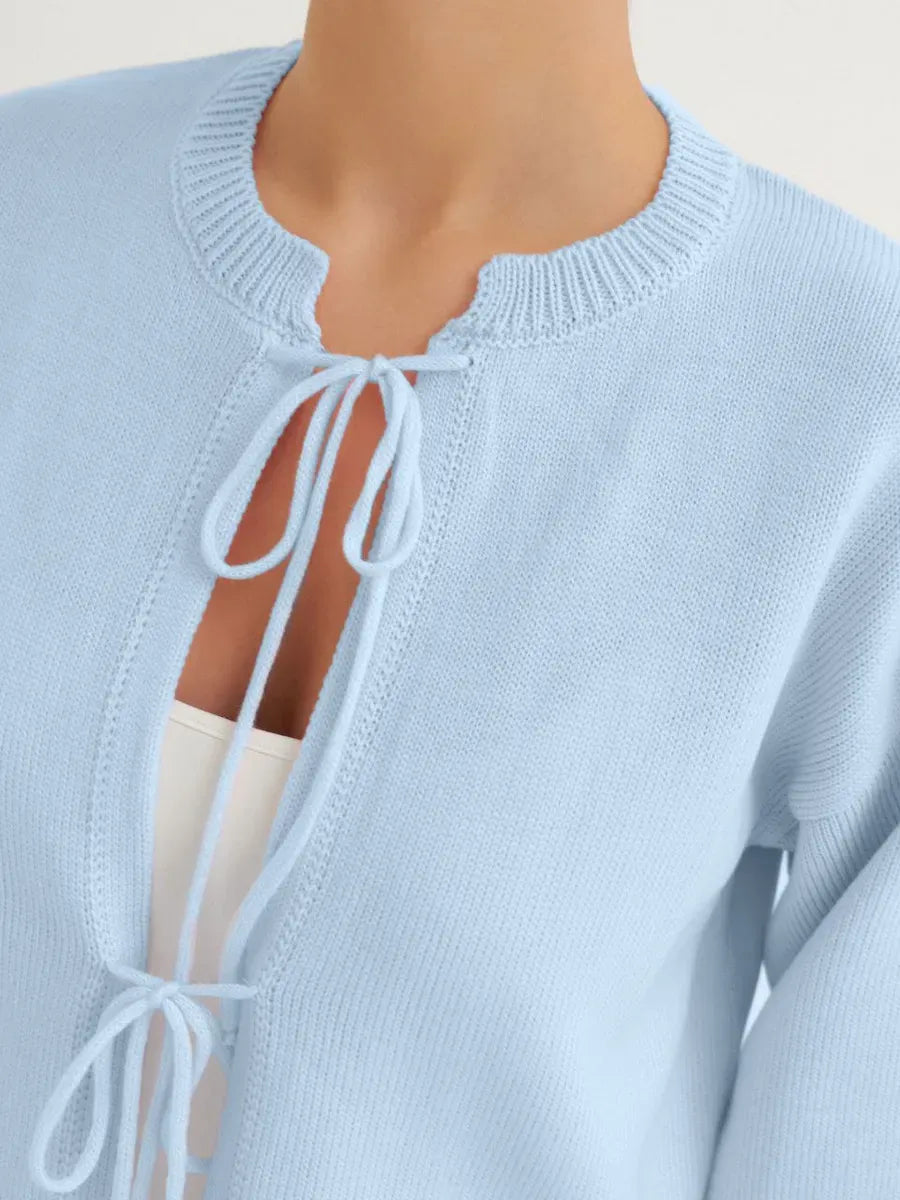 Celina Cardigan by Lauven in soft sky blue, featuring a lightweight design and cropped silhouette for summer style.