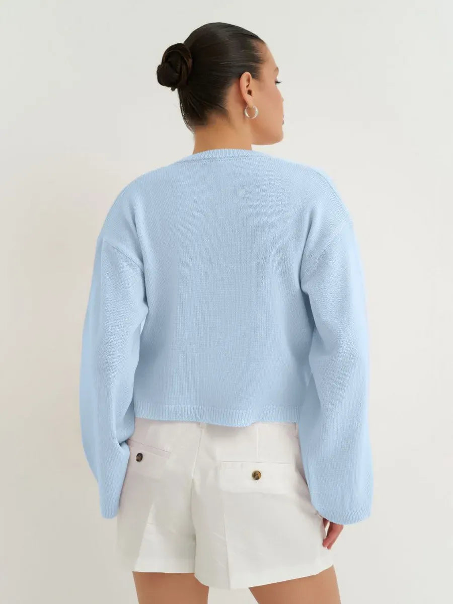 Celina Cardigan in soft sky blue, lightweight summer knitwear by Lauven, featuring a cropped silhouette.