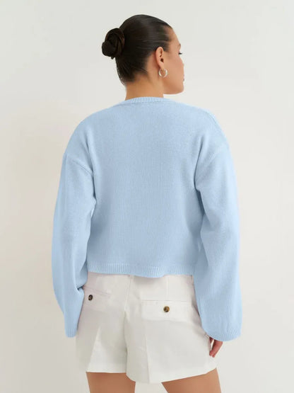 Celina Cardigan in soft sky blue, lightweight summer knitwear by Lauven, featuring a cropped silhouette.