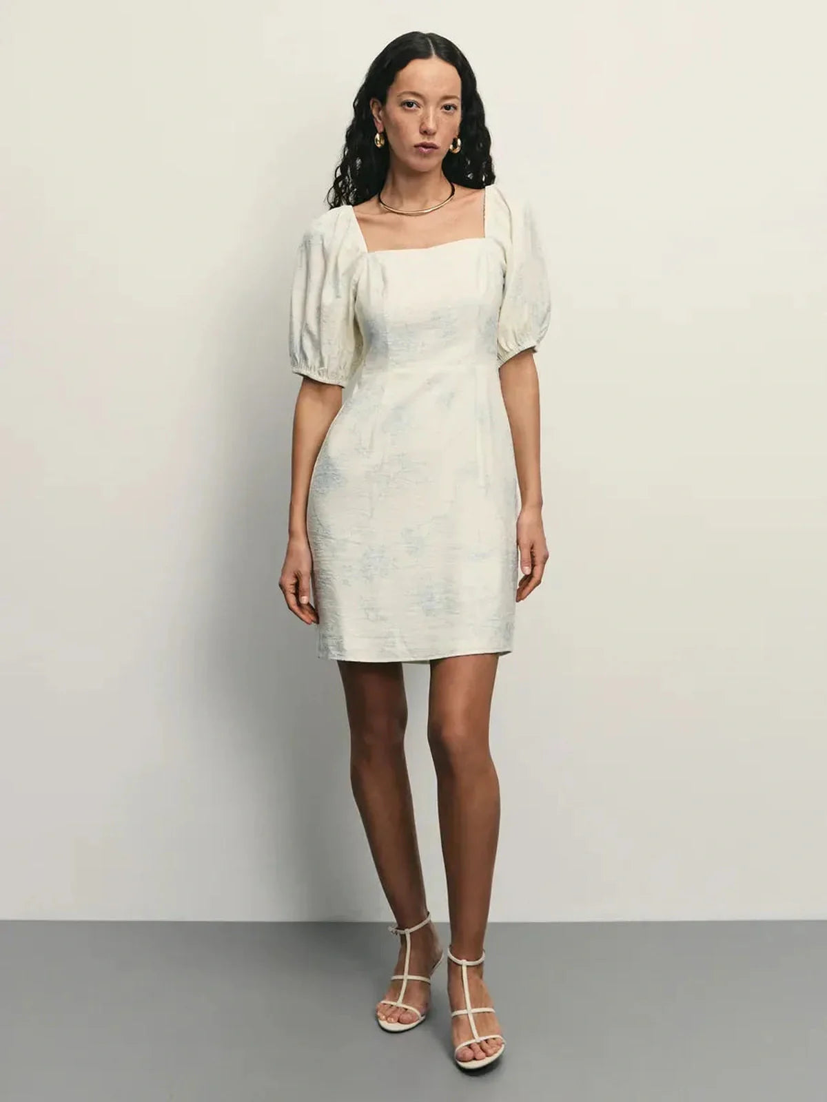 Elegant Cloud Bloom white mini dress with puff sleeves and square neckline, featuring a delicate floral pattern.