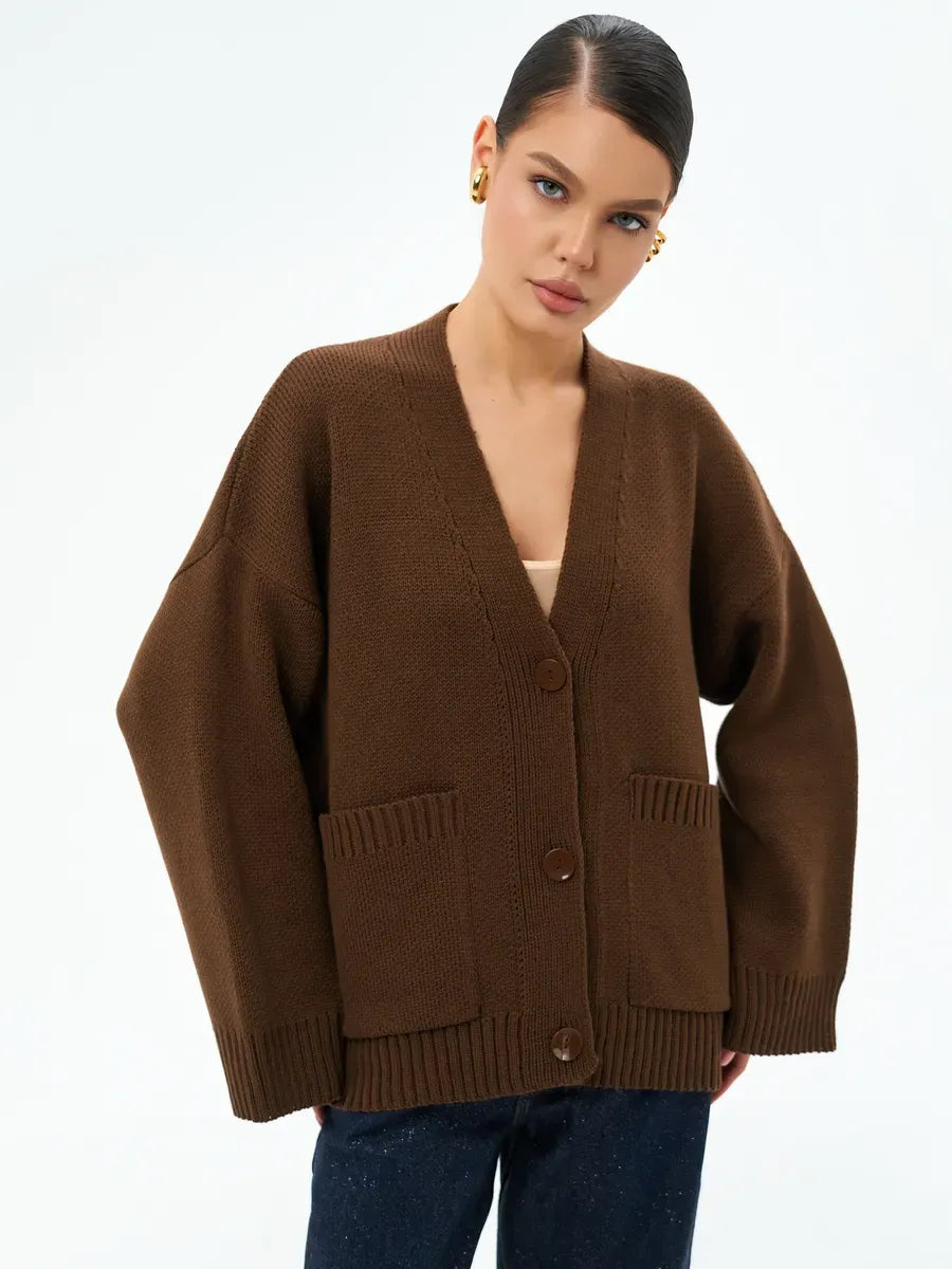 Cocoa Cardigan by Lauven, oversized warm knitwear in chocolate brown with button closure and pockets.