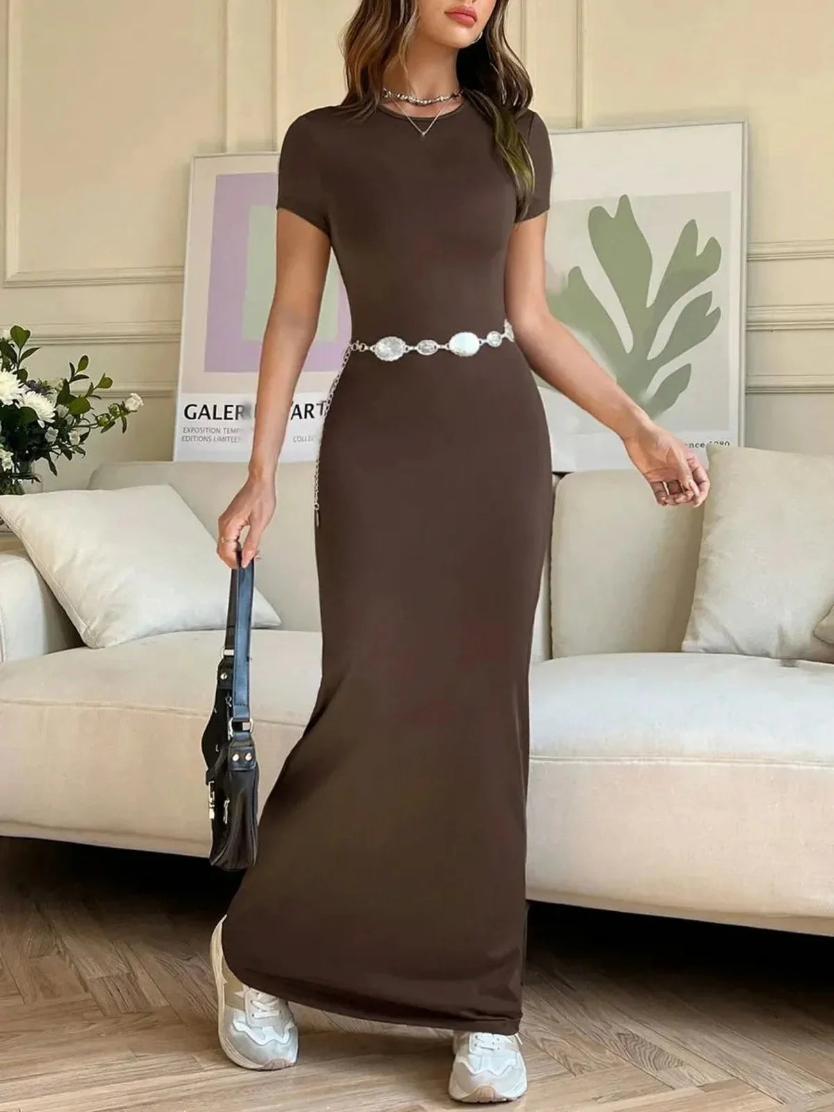 Cocoa Curve Maxi Dress in brown with short sleeves and a belt, showcasing a sleek fit and back slit.