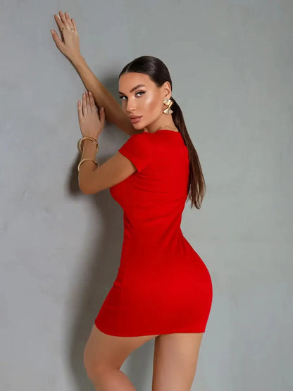 Model showcasing a body-hugging red mini dress, perfect for parties or special occasions.