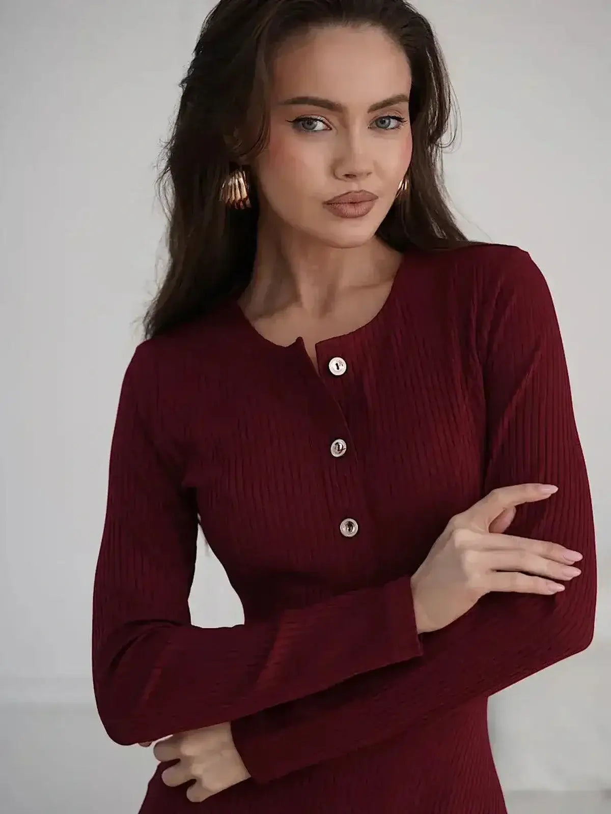 Crimson Grace Midi Dress by Lauven, featuring ribbed texture and gold button detail in burgundy hue.