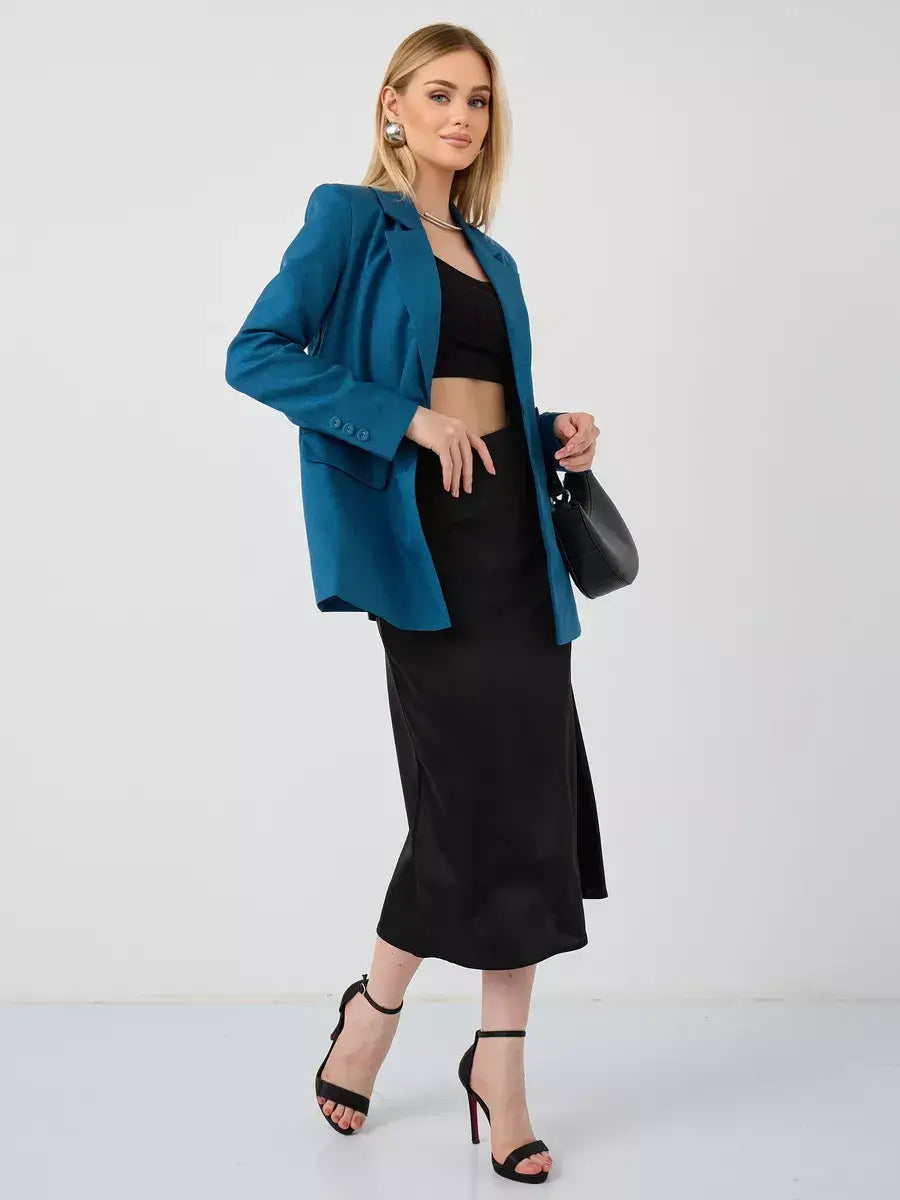 Diana Blazer by Lauven, a stylish cropped women's blazer in blue, paired with a black outfit for elegance.