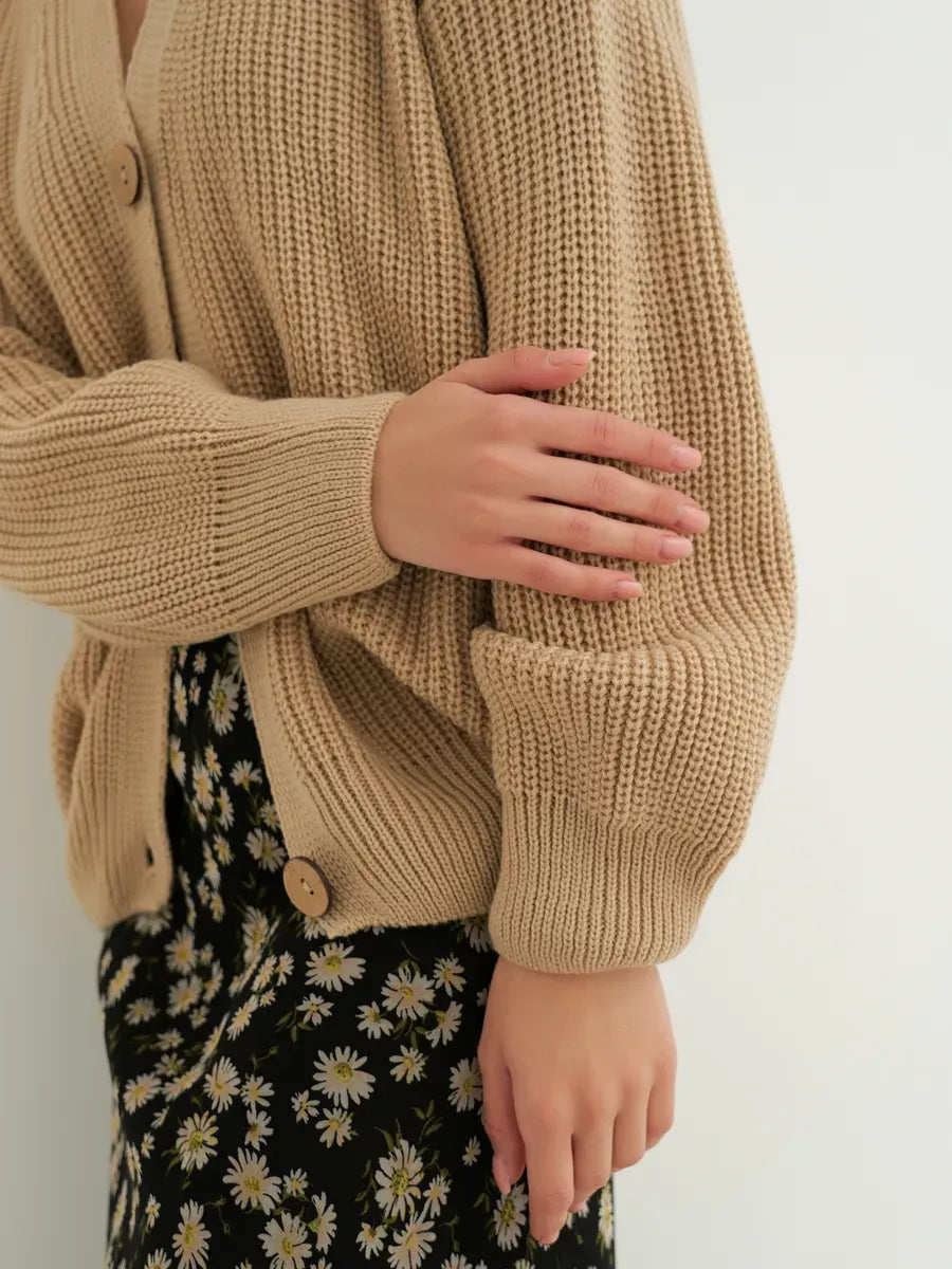 Dune Cardigan by Lauven shown in dark beige, featuring oversized fit and cozy button-front design, perfect for stylish looks.
