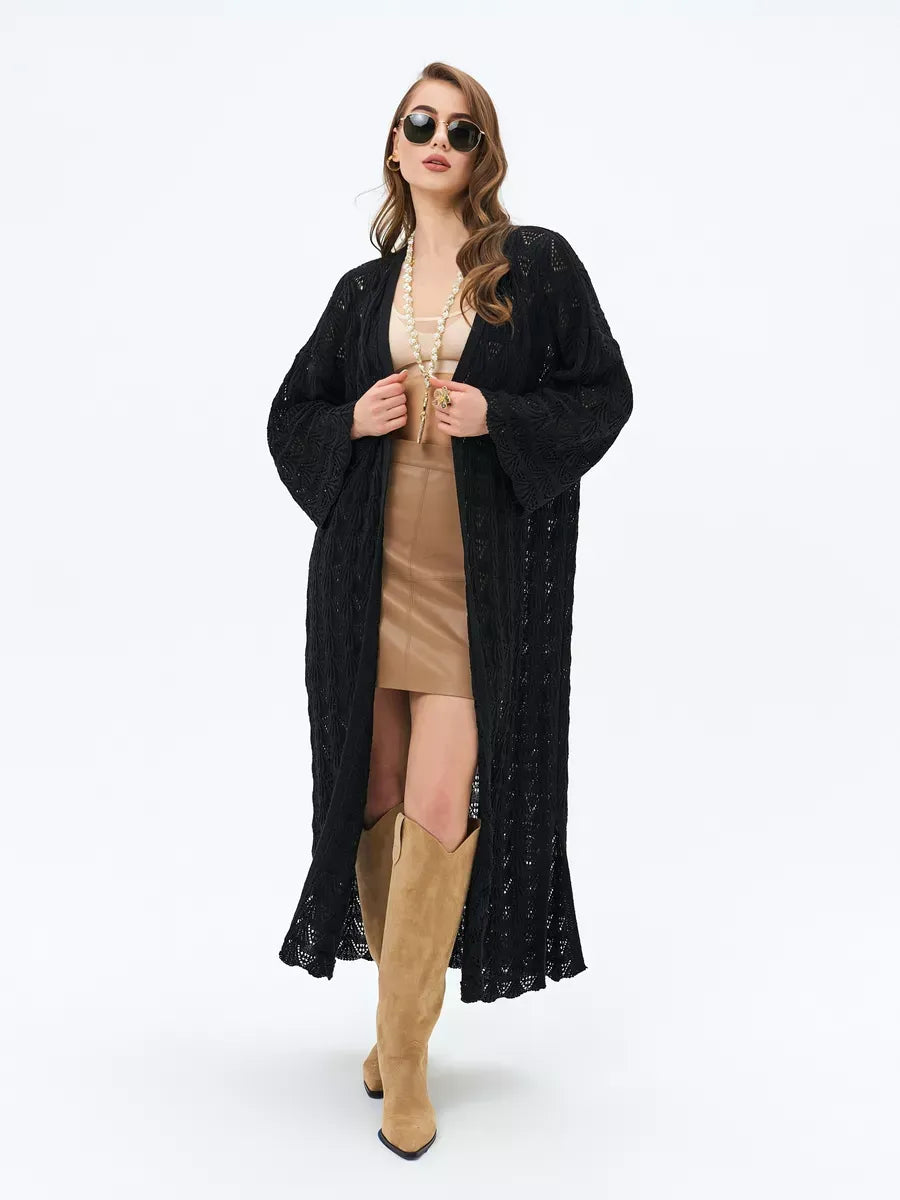 Ebony Cardigan by Lauven, a lightweight openwork summer cardigan in black, styled with a chic outfit.