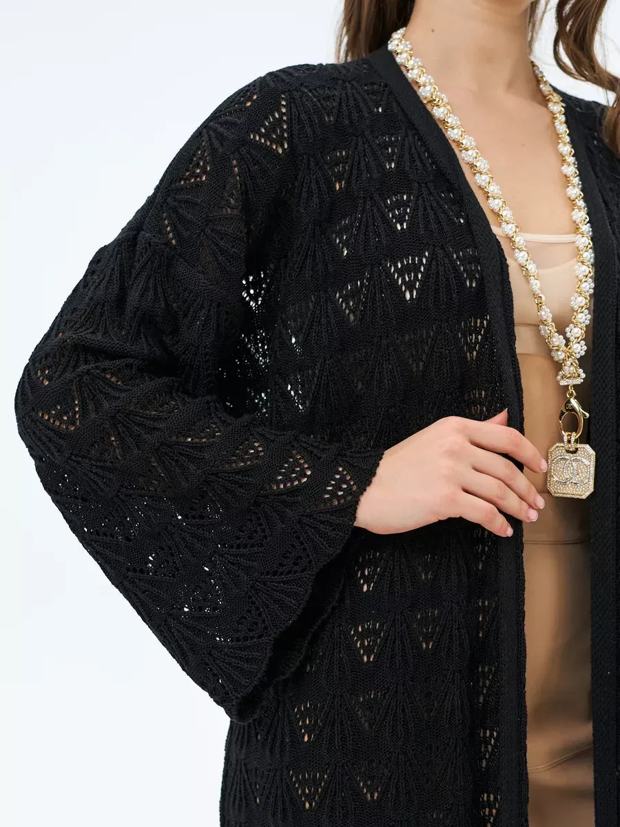 Ebony Cardigan by Lauven featuring intricate lace patterns and lightweight openwork design, perfect for summer layering.