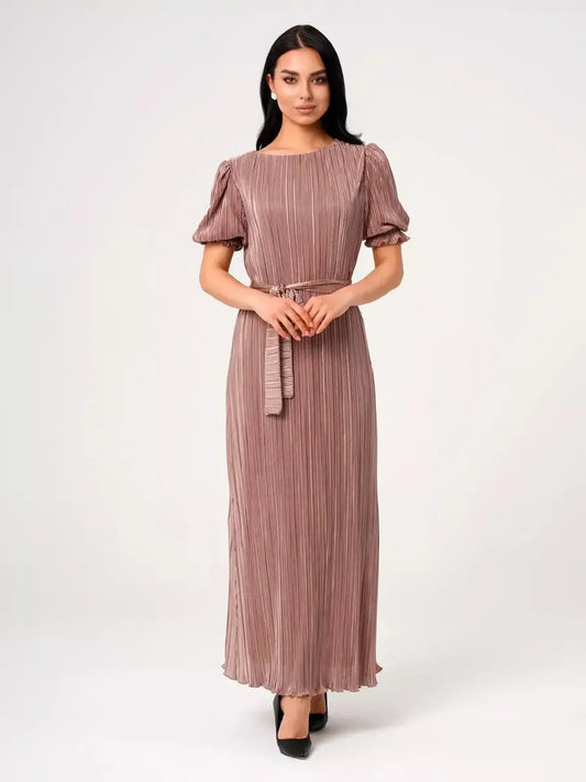 Elegant Celeste Maxi Dress with pleated texture and puff sleeves, perfect for weddings or formal events.