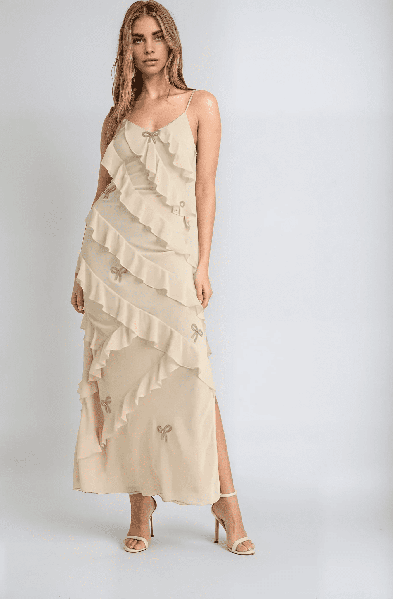 Elegant Elodie Maxi Dress in creamy champagne with ruffles, perfect for wedding guests or formal occasions.