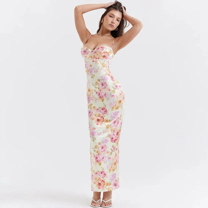 Elodie Maxi Dress featuring a stunning floral print, perfect for summer weddings or special occasions, elegantly fitting the body.
