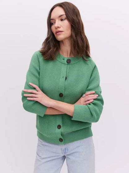 Emerald Cardigan by Lauven worn by model, showcasing a fresh green knit with button front and relaxed fit.