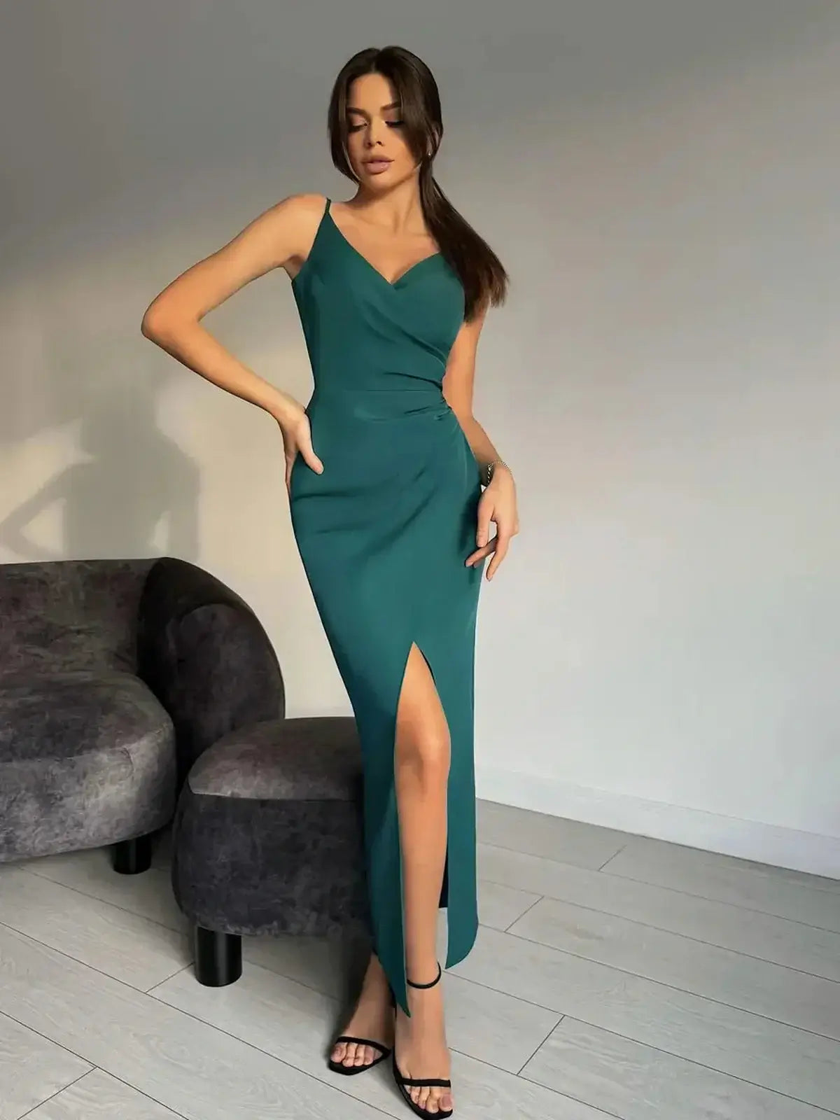 Emerald Drape Maxi Dress featuring a thigh-high slit and a sculpted fit, perfect for formal occasions.