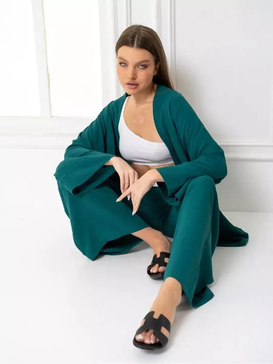 Emerald Suit Set by Lauven, featuring a luxurious green oversized two-piece set with a kimono-style robe.