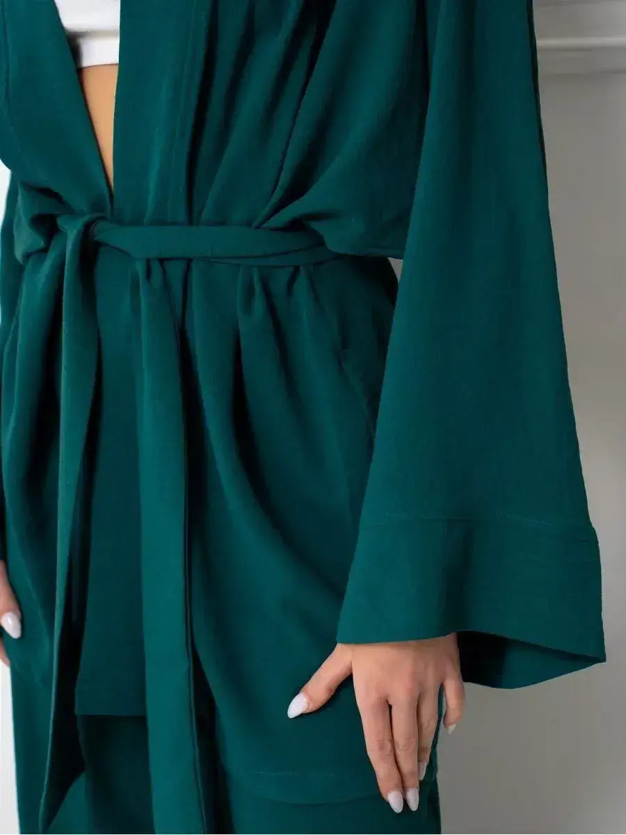 Emerald Suit Set by Lauven featuring an oversized kimono-style robe in luxurious green fabric with a matching belt.