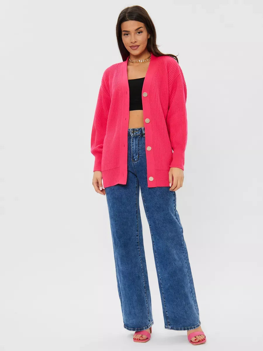 Fuchsia Cardigan by Lauven, oversized bright pink knitwear styled with casual jeans and a crop top.