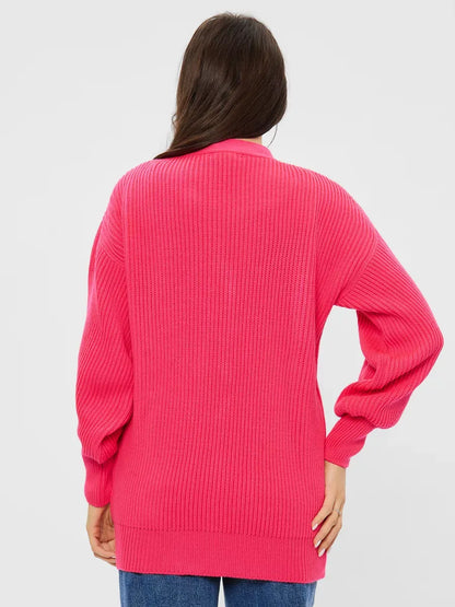 Fuchsia Cardigan by Lauven showcasing a stylish oversized wool blend knitwear in bright pink from the back.