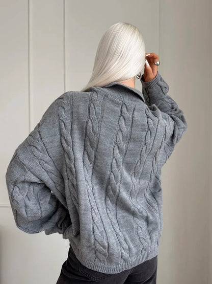 Graphite Sweater by Lauven - Oversized women's cable knit sweater in deep grey, showcasing a cozy design.