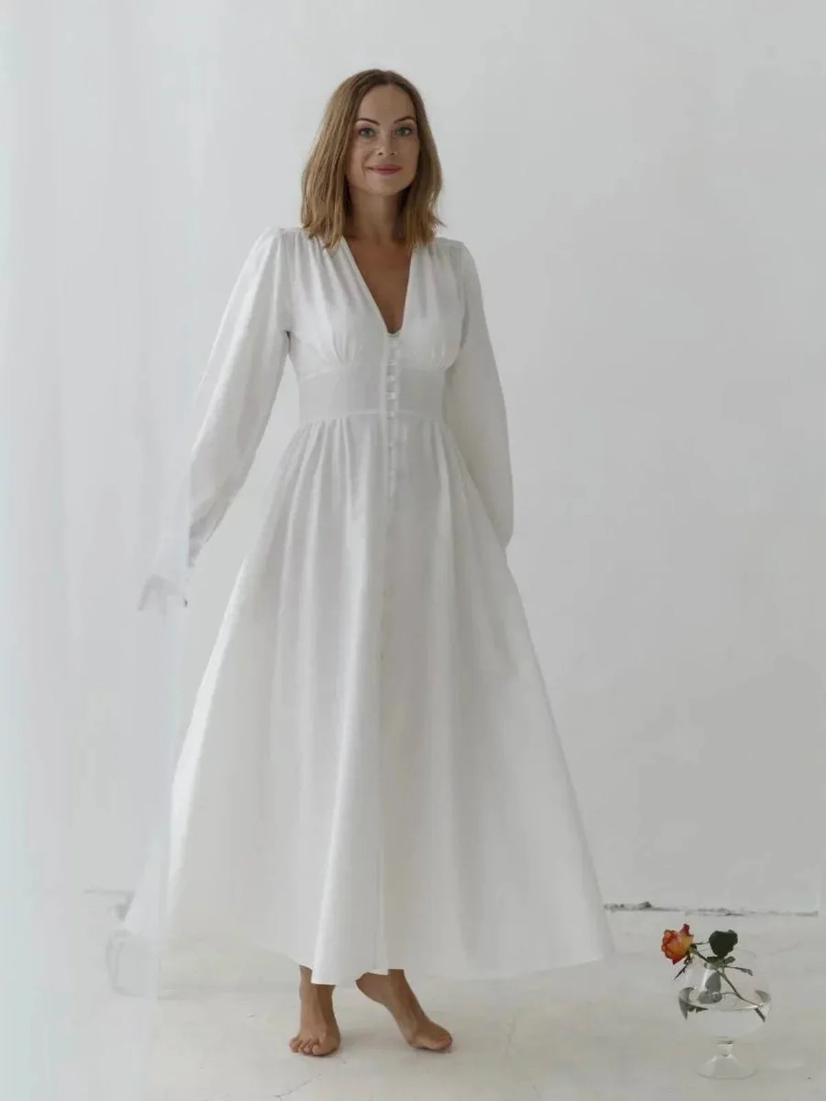 Heirloom Maxi Dress in white cotton, featuring vintage-inspired design with button-down front and long sleeves.