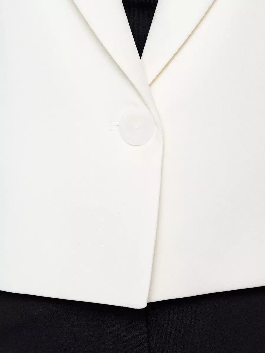 Luna Blazer by Lauven, cropped ivory jacket featuring an oversized fit and button closure for stylish women's fashion.