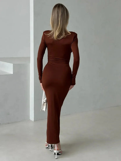 Sienna Plunge Maxi Dress showcasing a sleek silhouette in rich sienna, perfect for elegant occasions.