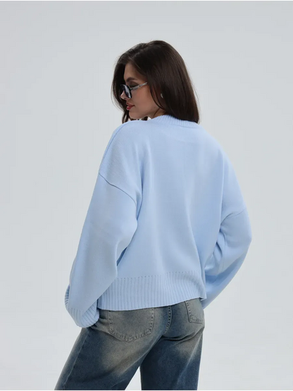 Celine Sweater by Lauven, oversized knit in sky blue, showcasing a stylish back view.