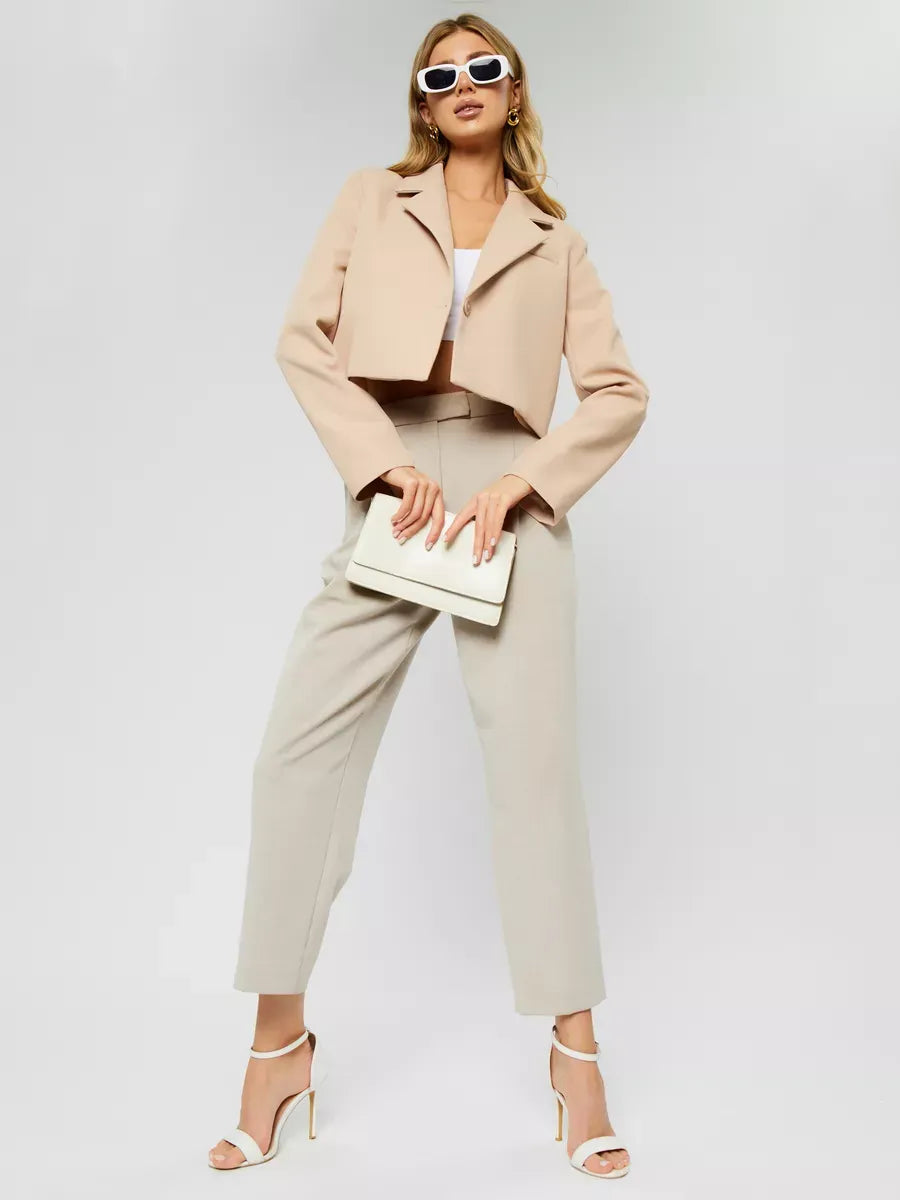 Sahara Blazer by Lauven - Women’s beige cropped oversized jacket styled with chic accessories.