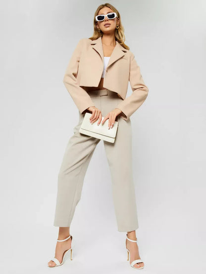 Sahara Blazer by Lauven - Women’s beige cropped oversized jacket styled with chic accessories.