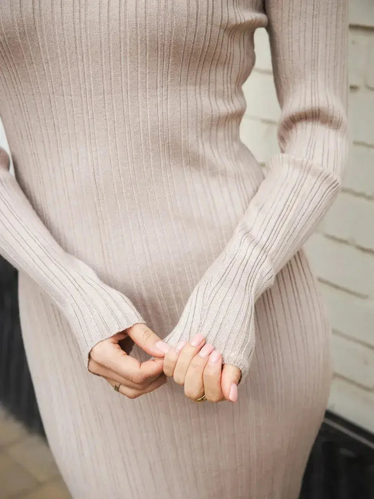 Close-up of soft ribbed texture on Contour Knit Maxi Dress showcasing long sleeves and stylish fit.